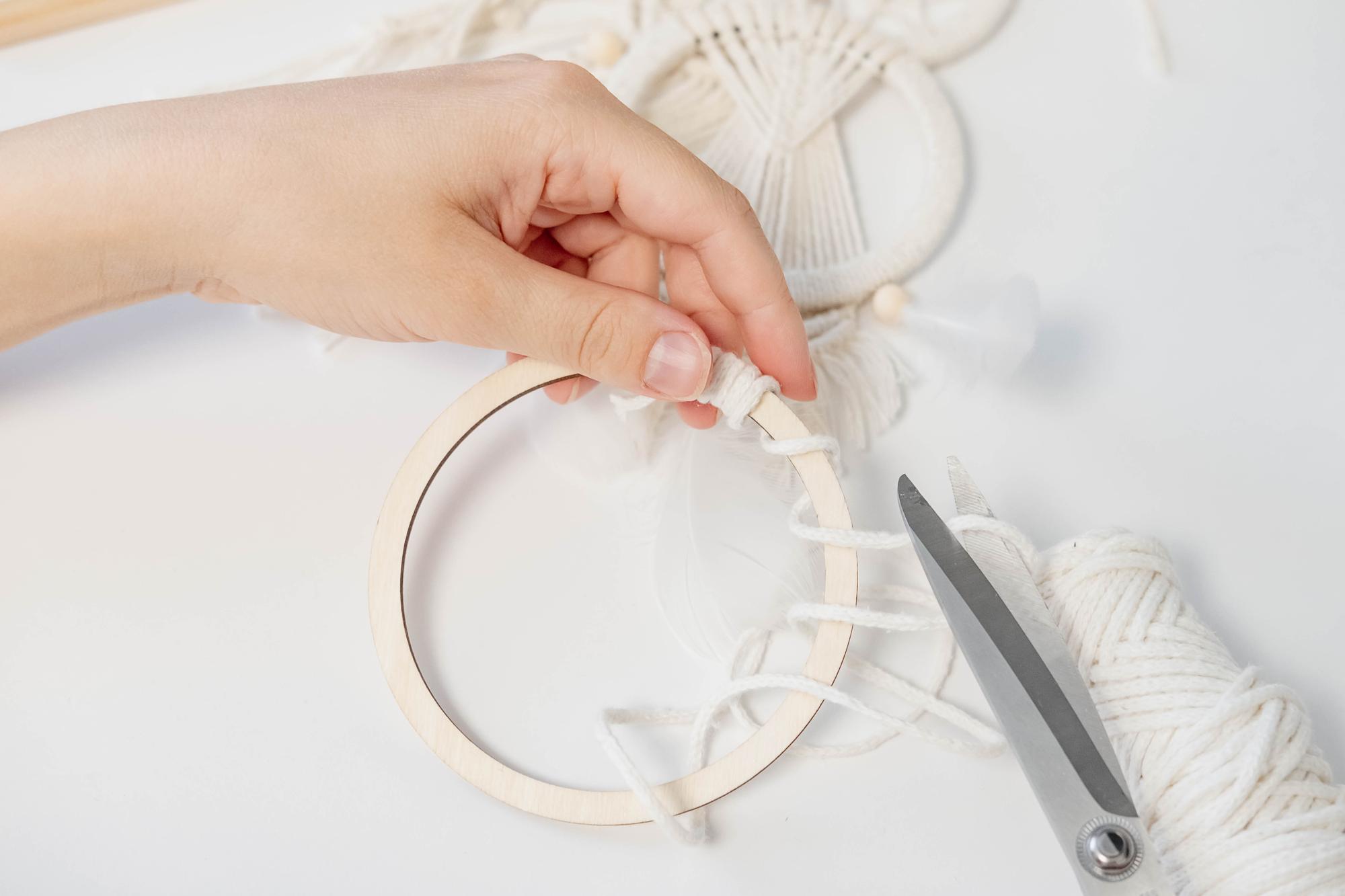 Main workspace with embroidery hoop and thread